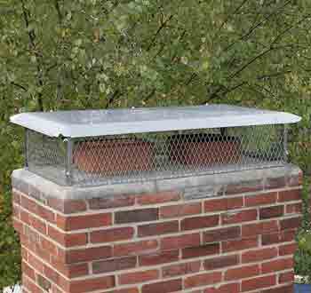 Chimney Cap - Photo of a chimney cap installed on a double brick chimney.