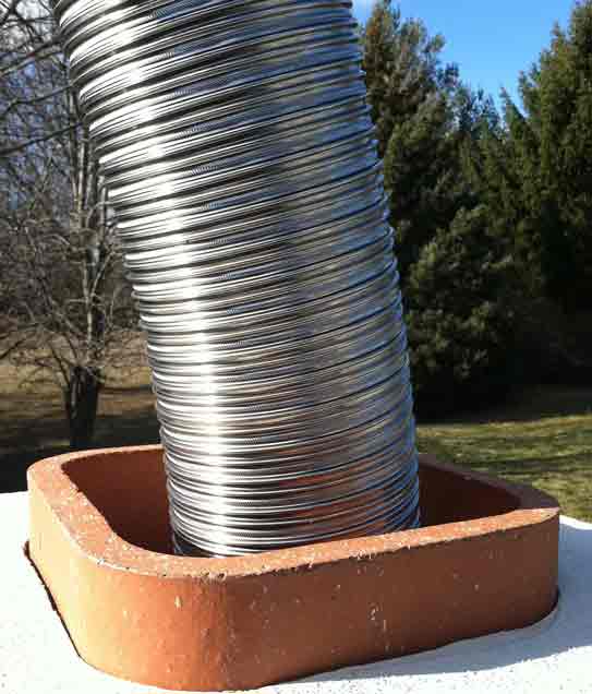 Stainless Steel Liner: Installation of a stainless steel chimney liner in a chimney.